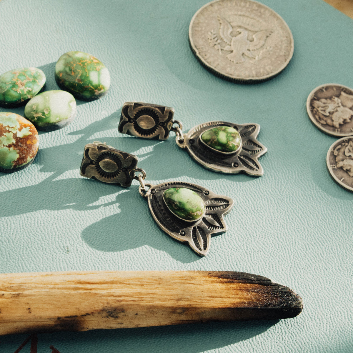 A pair of hand-wrought sterling silver two-tier drop earrings featuring Sonoran Gold turquoise, each stone a bright lime-green face veined with golden matrix — view 2