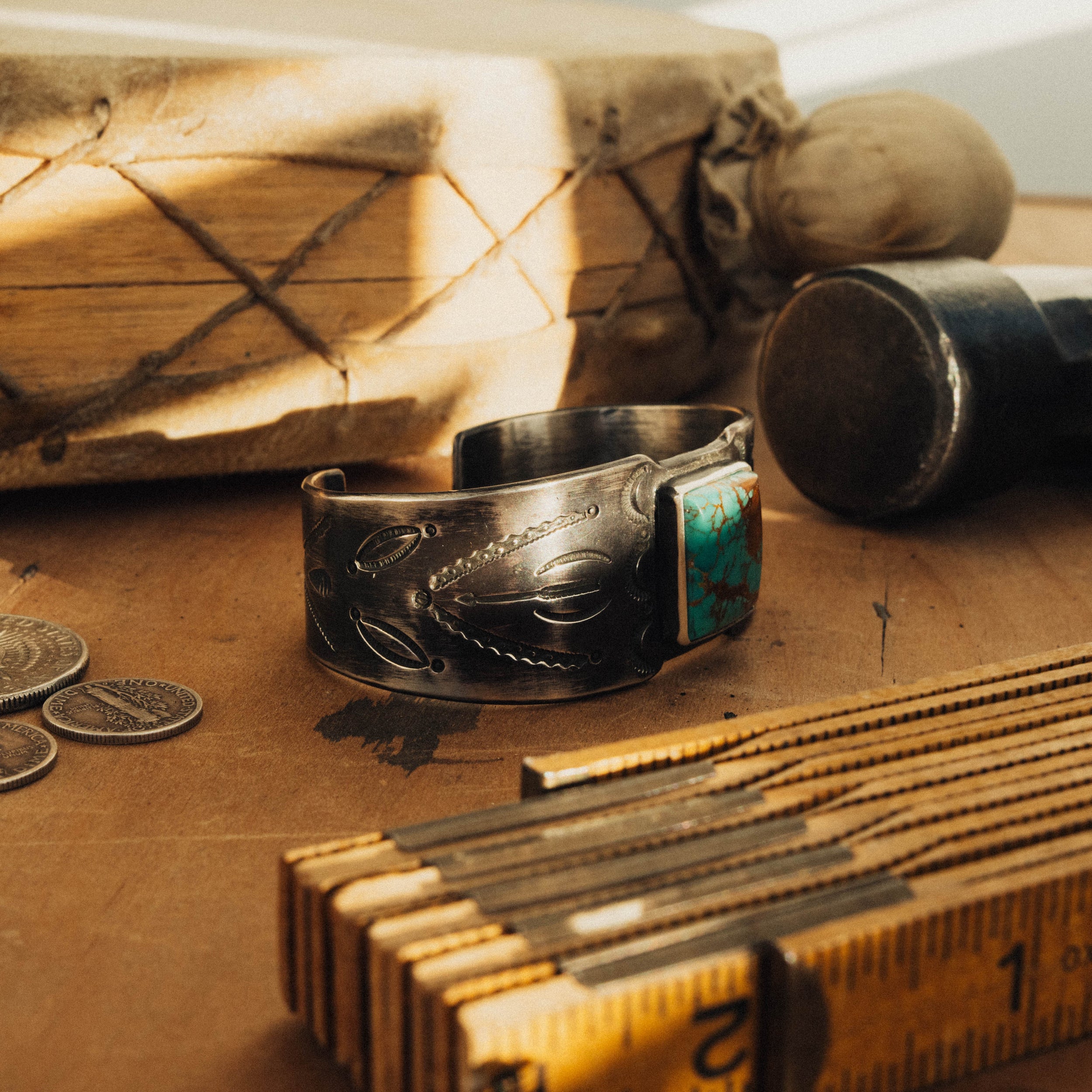 A one-of-a-kind sterling cuff set with high-grade Royston turquoise, intricately hand-stamped and finished with a dark patina — view 2