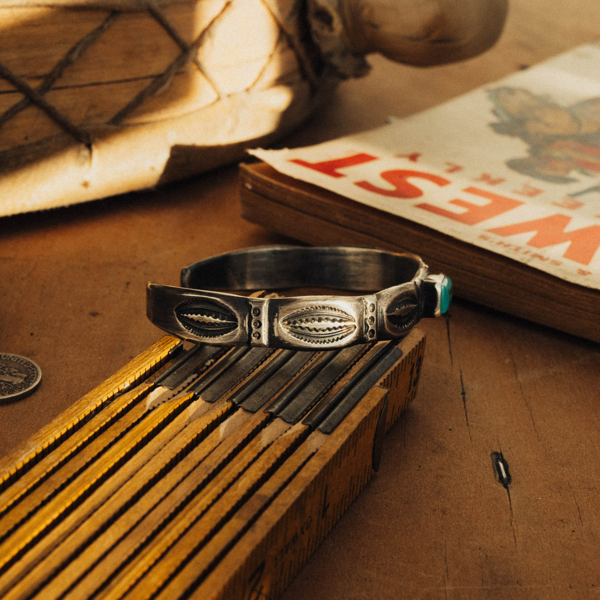 A hand-wrought sterling silver stacking cuff set with a rectangular Royston turquoise stone, its pale mint-green face touched with soft matrix, placed in a smooth straight bezel — view 2