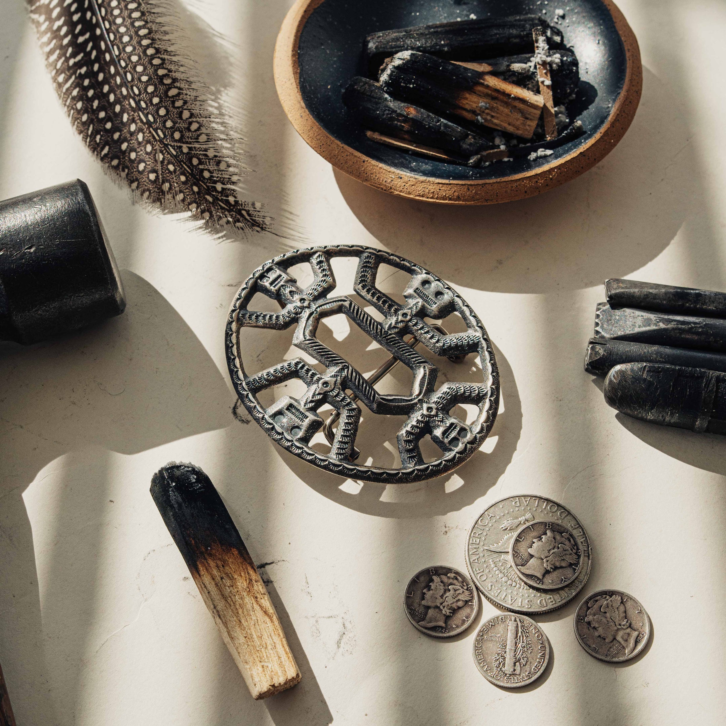 A kachina-motif sandcast buckle in sterling silver, deeply stamped and handmade by Roland Dixson — view 2