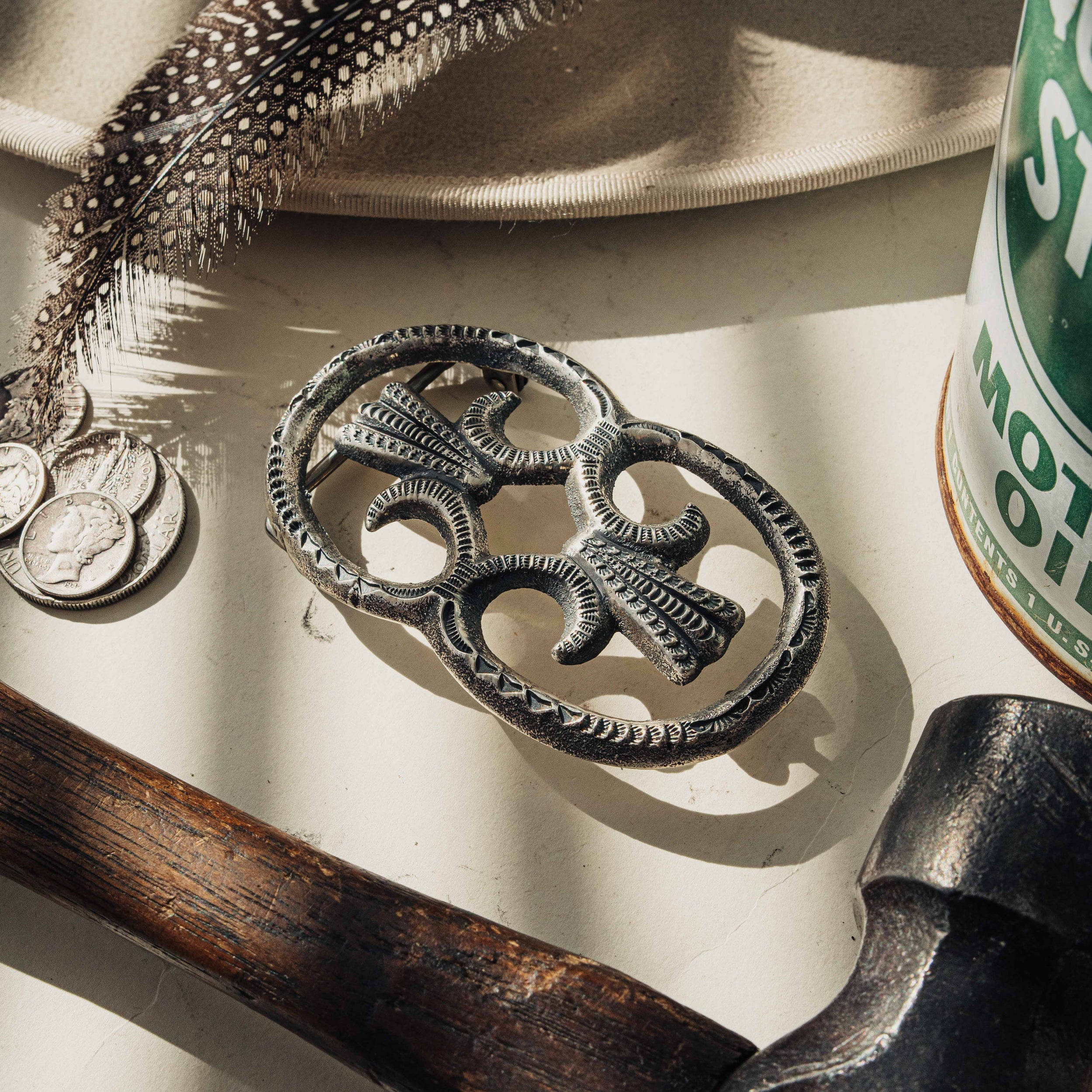 A sterling silver sandcast belt buckle with deep, intricate stamping, handmade by Roland Dixson — view 2