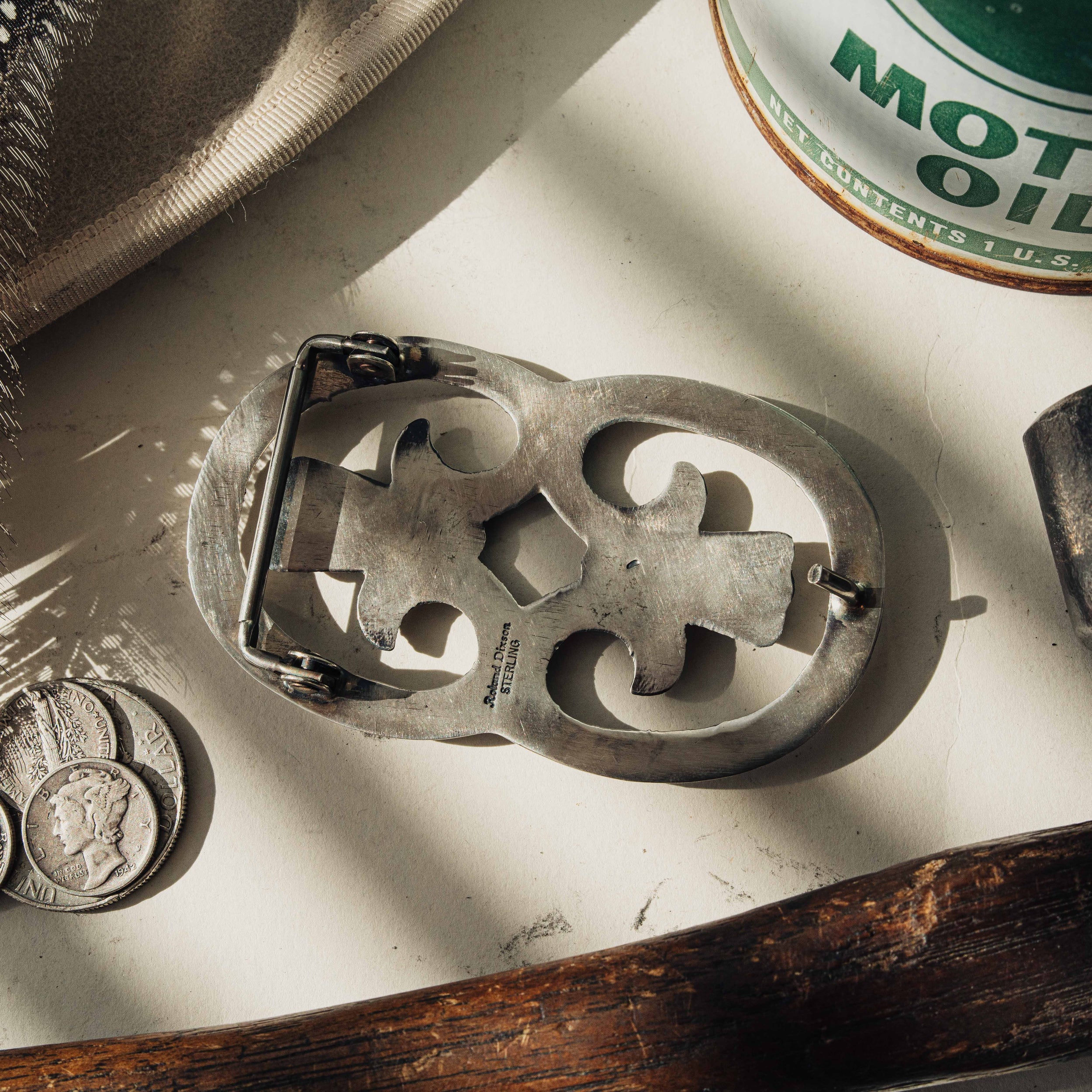 A sterling silver sandcast belt buckle with deep, intricate stamping, handmade by Roland Dixson — view 3