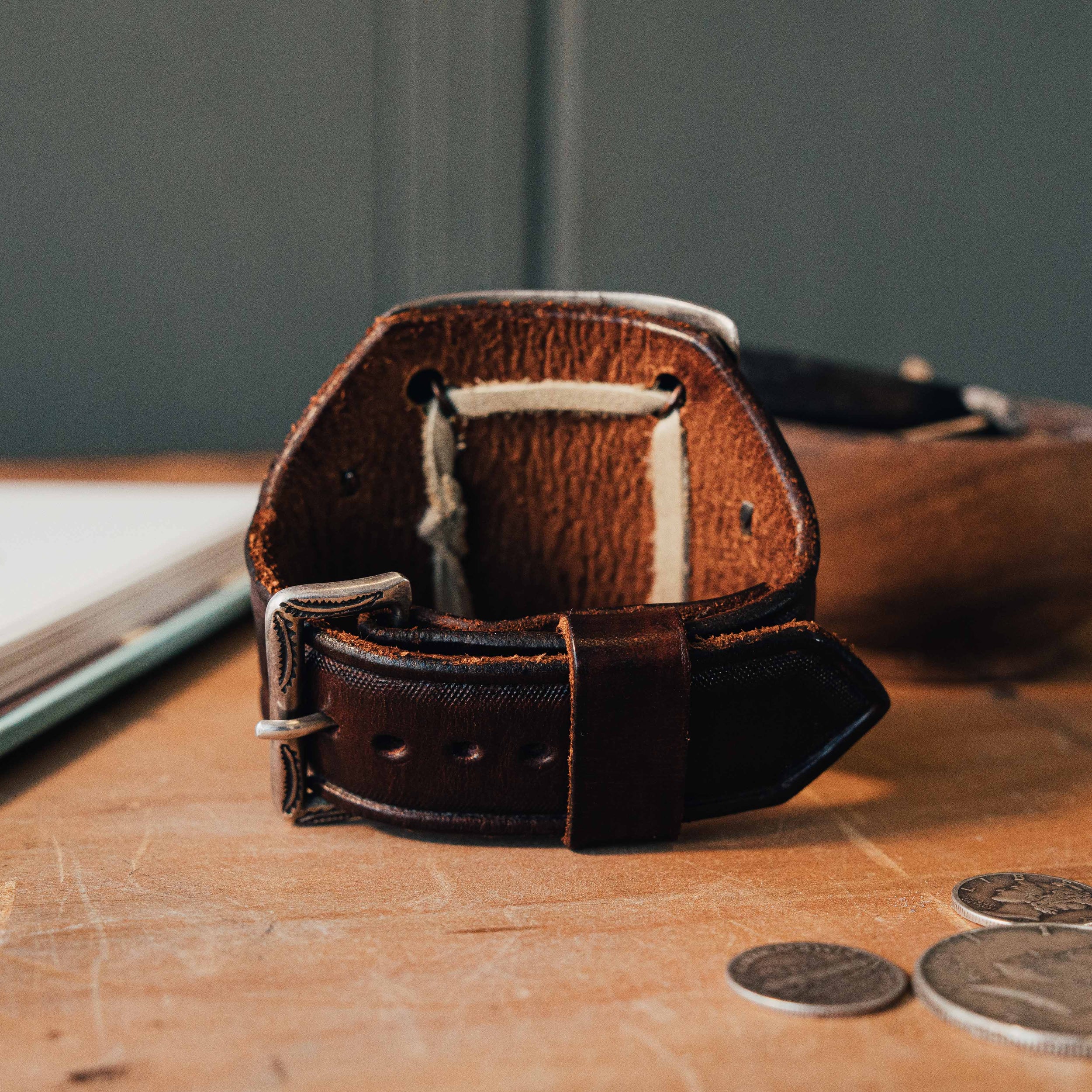 A coin silver bow guard ('ketoh') by the renowned silversmith Buffalo, on hand-tooled leather — view 3