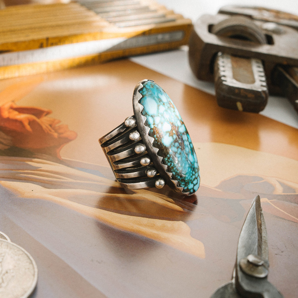 A high-grade Kingman Water Web turquoise stone sits in a hand-filed serrated bezel, set atop a six-prong split shank accented with silver beads and finished with a hand-stamped underside — view 2