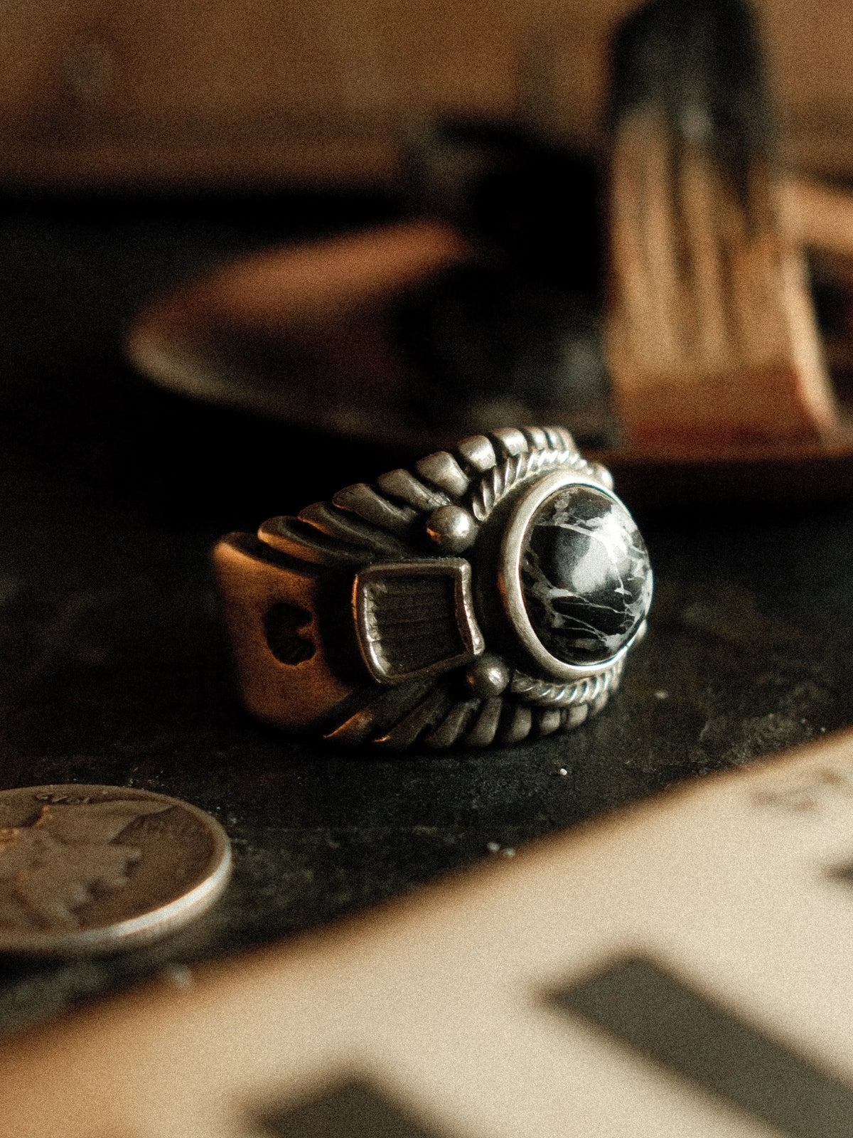 A premium 10mm White Buffalo stone on a heavy sterling Chief ring with hand-struck side detailing. — view 2