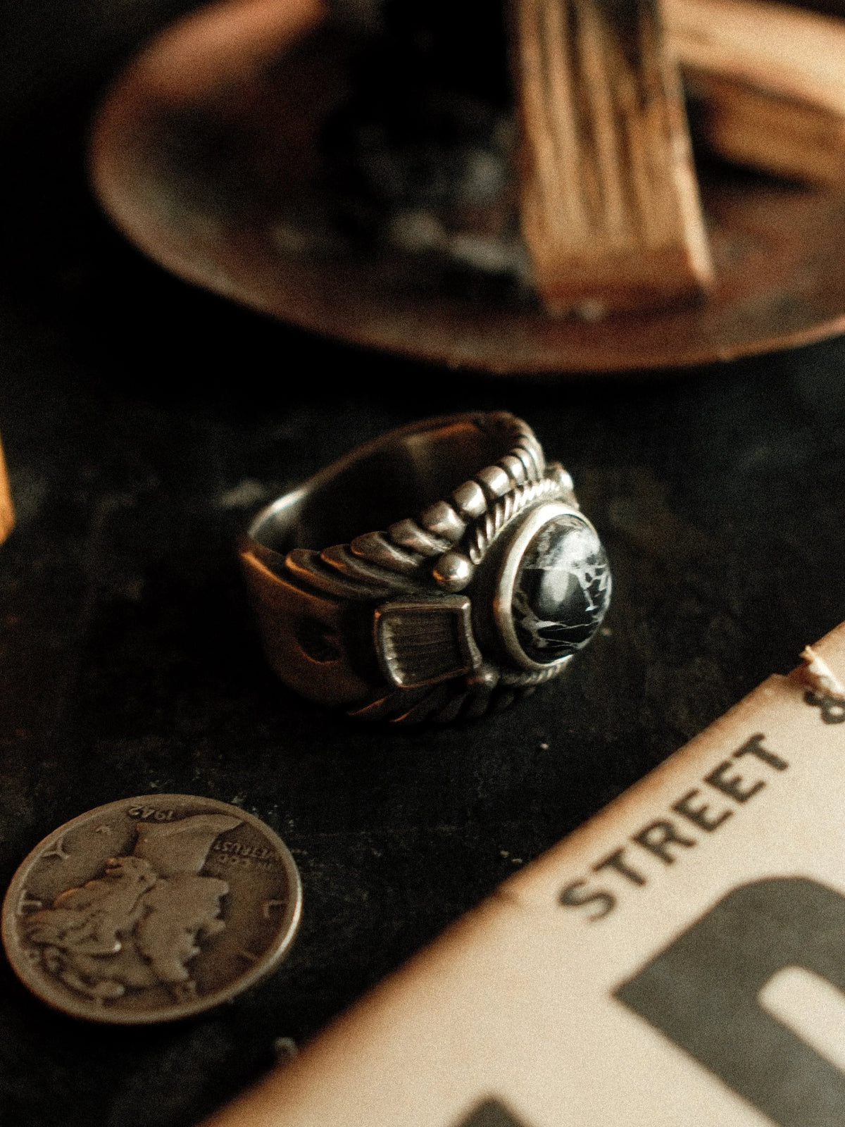 A premium 10mm White Buffalo stone on a heavy sterling Chief ring with hand-struck side detailing. — view 3