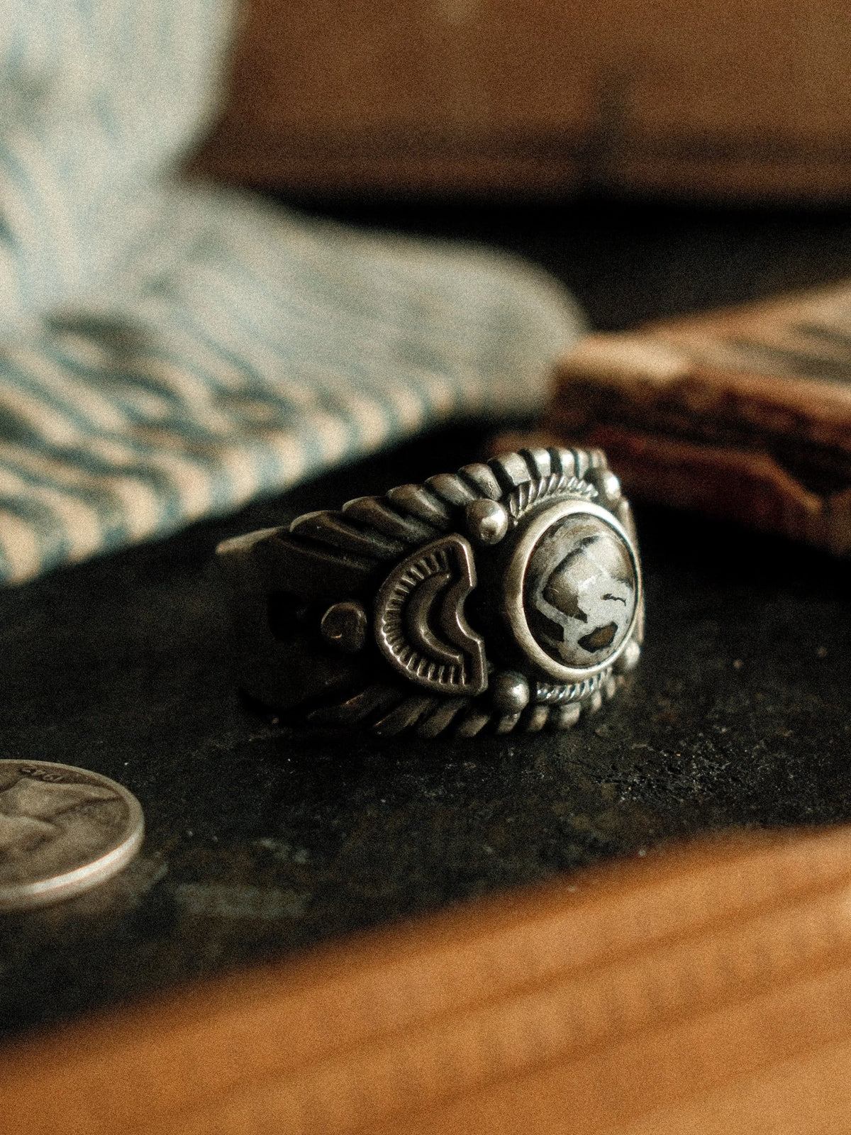 A premium 10mm White Buffalo stone on a heavy sterling Chief ring with hand-struck side detailing — view 2