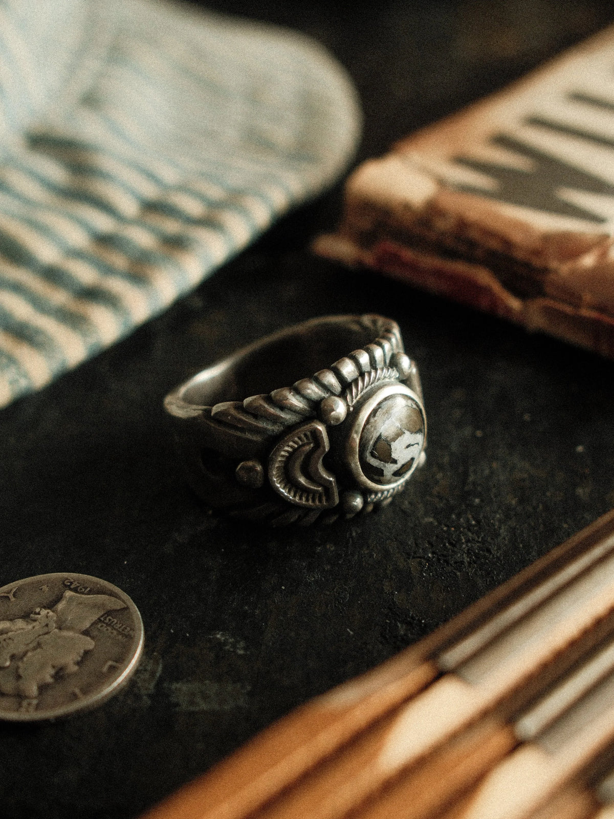 A premium 10mm White Buffalo stone on a heavy sterling Chief ring with hand-struck side detailing — view 3