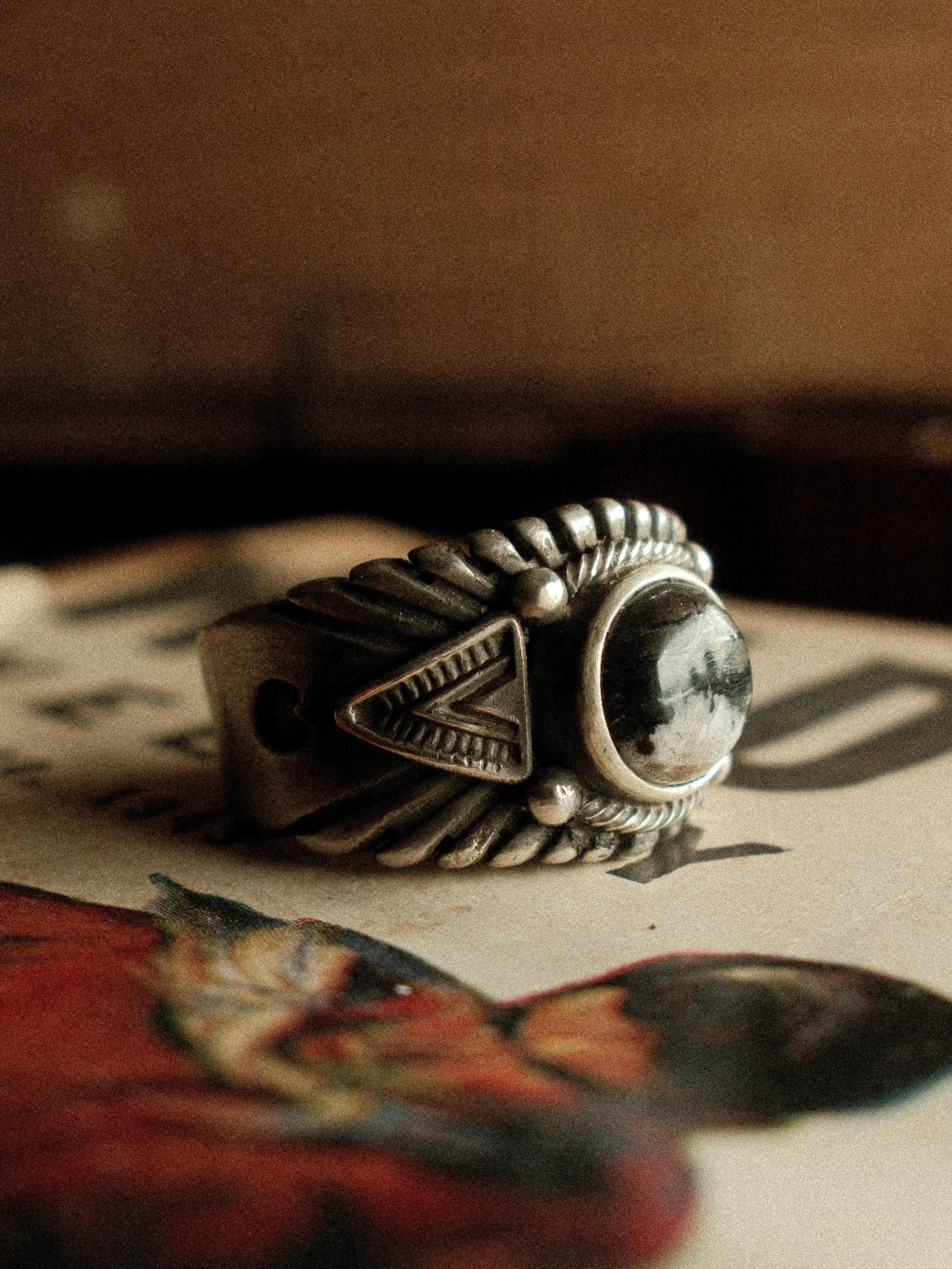A frontier-heirloom Chief ring — premium White Buffalo stone, hand-struck detailing, substantial sterling weight — view 2