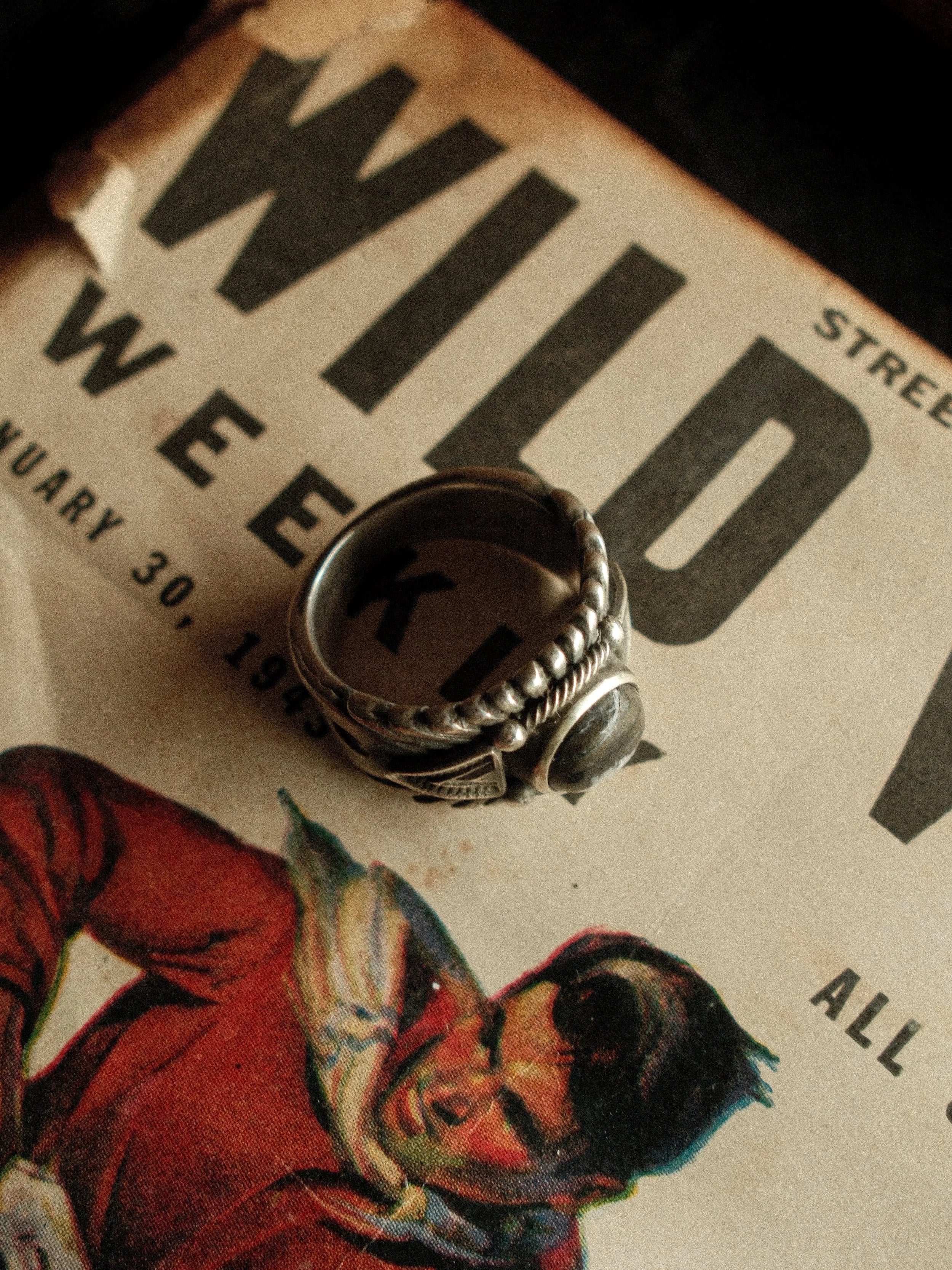 A frontier-heirloom Chief ring — premium White Buffalo stone, hand-struck detailing, substantial sterling weight — view 3