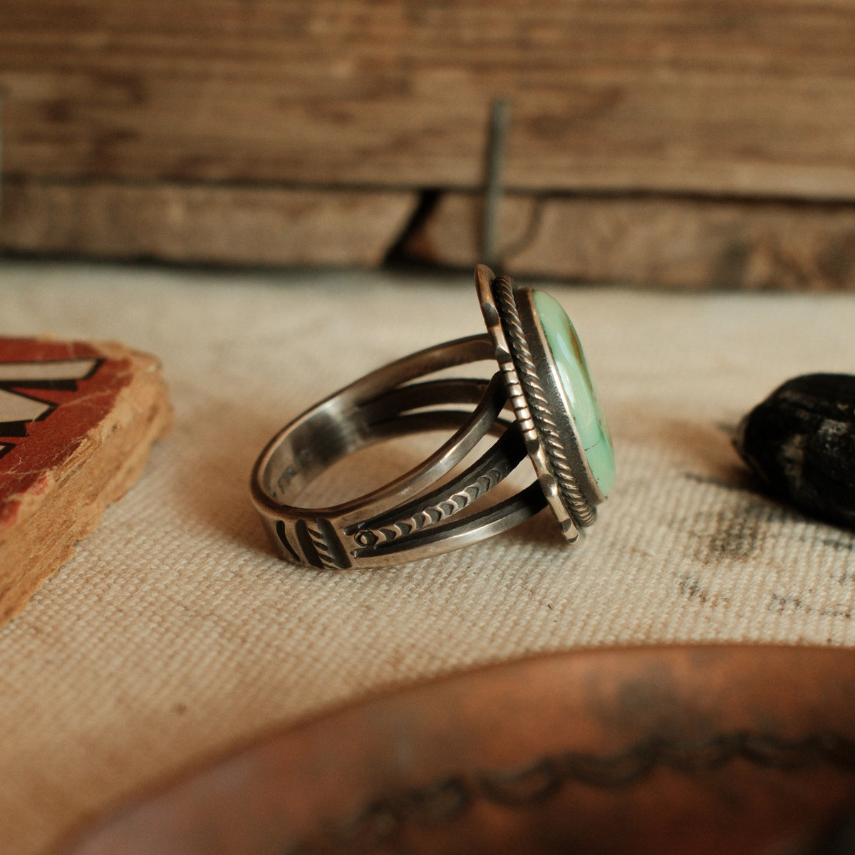 A one-of-a-kind 12×18mm Royston turquoise in a straight bezel inside a twist wire border, on a three-prong stamped split shank — view 3