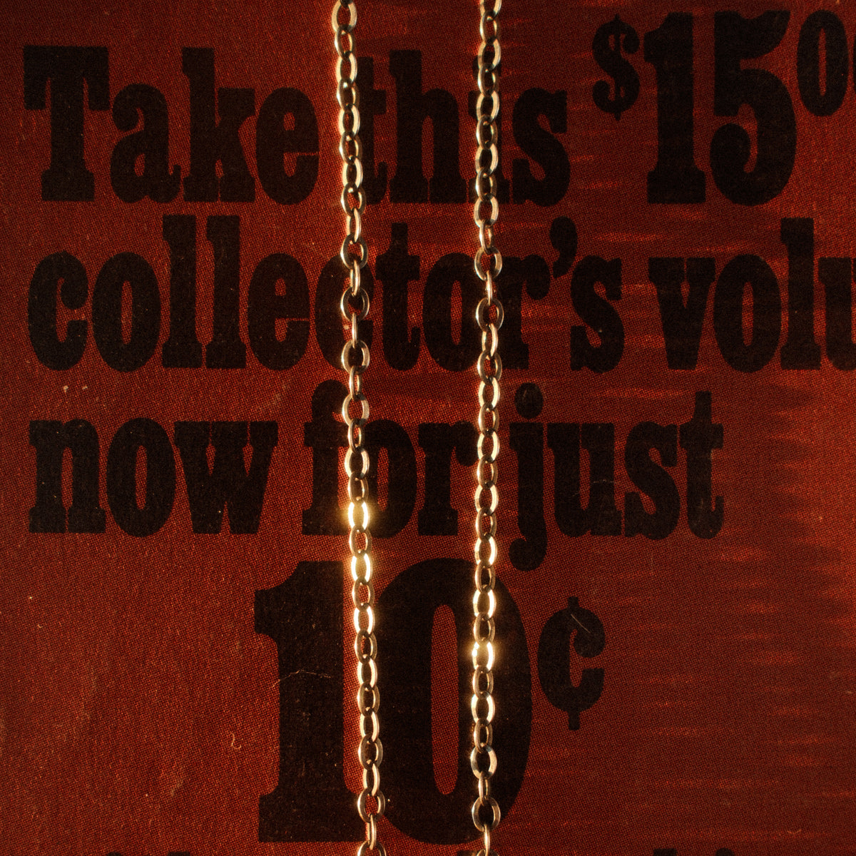 A lightweight sterling silver cable chain with flat oval links in 16 to 20 inch lengths, finished with a lobster clasp and a hand-applied patina.