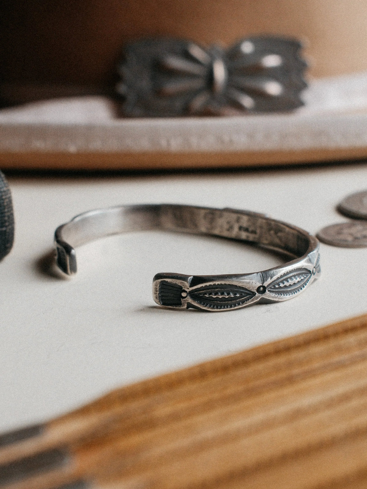 Poured from a tufa-cast ingot and hand-stamped with Chad's own steel, set with a piece of Royston turquoise — view 3