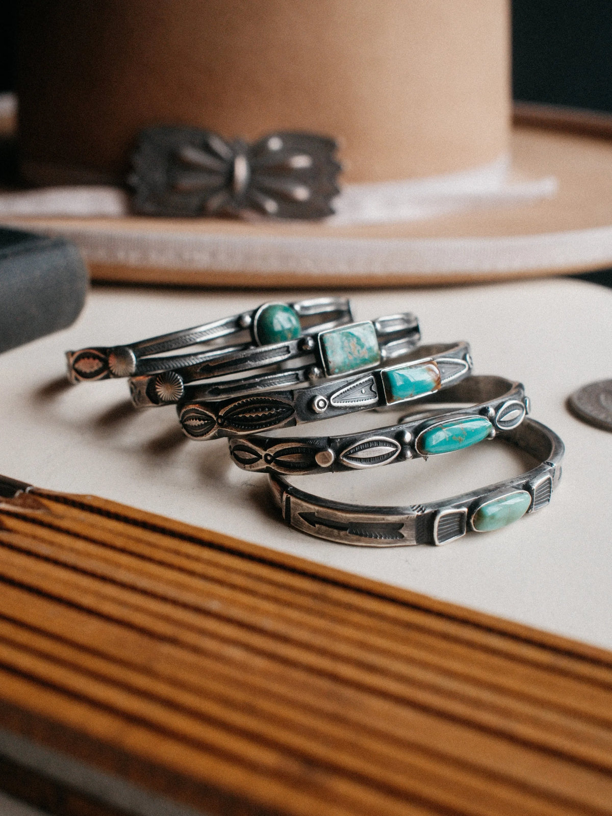 Poured from a tufa-cast ingot and hand-stamped with Chad's own steel, set with a piece of Royston turquoise — view 4
