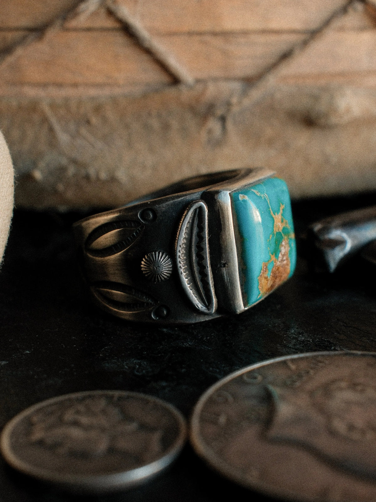 A tiered Bandolero ring hand-stamped with Chad's own steel and set with a piece of Kingman turquoise — view 2