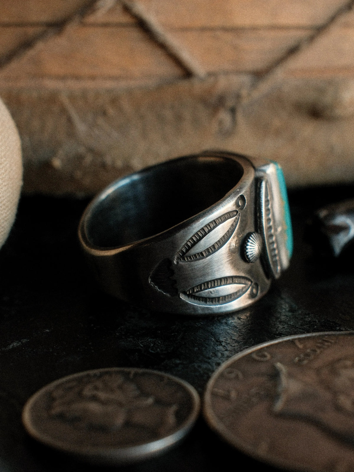 A tiered Bandolero ring hand-stamped with Chad's own steel and set with a piece of Kingman turquoise — view 3