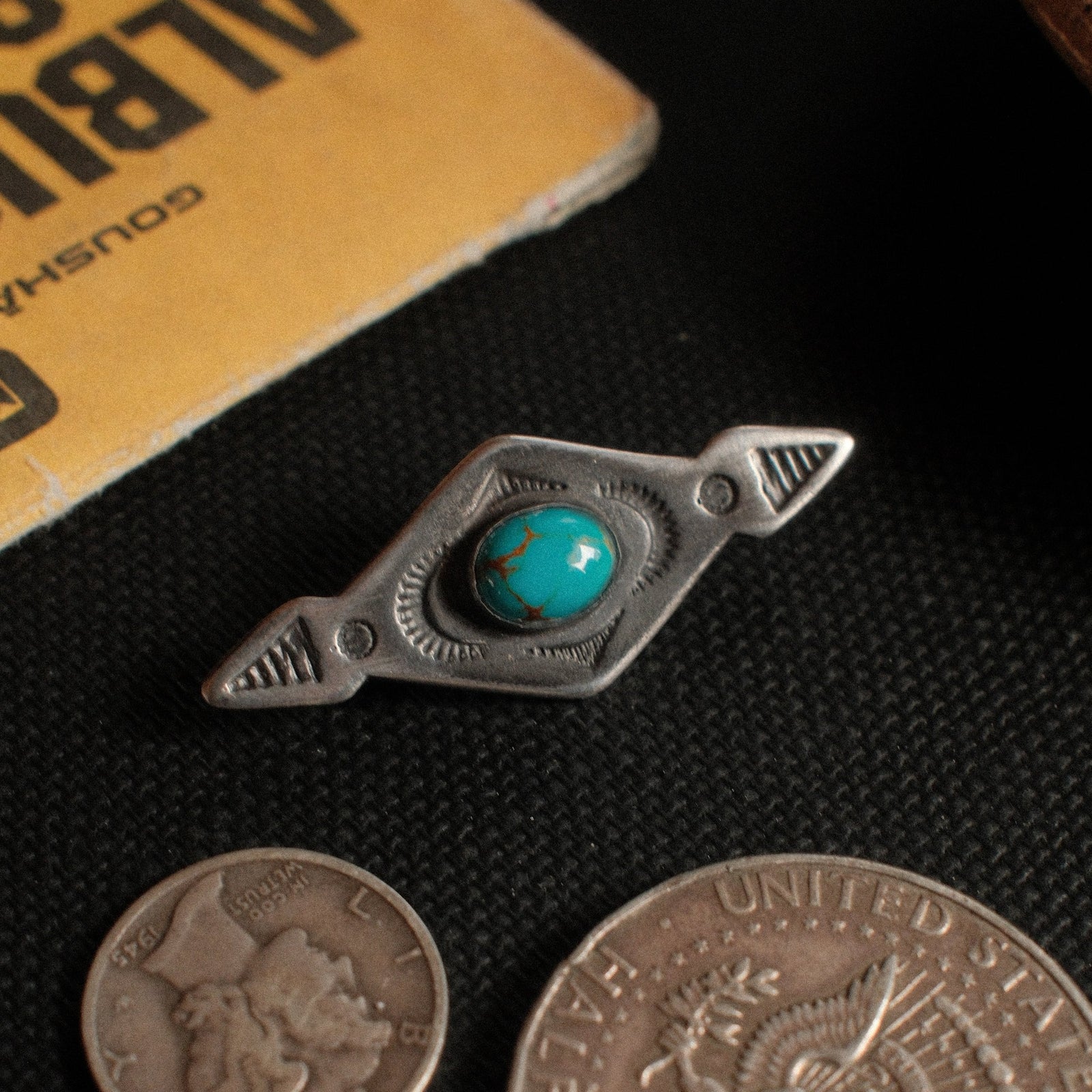 The Taos Pin
