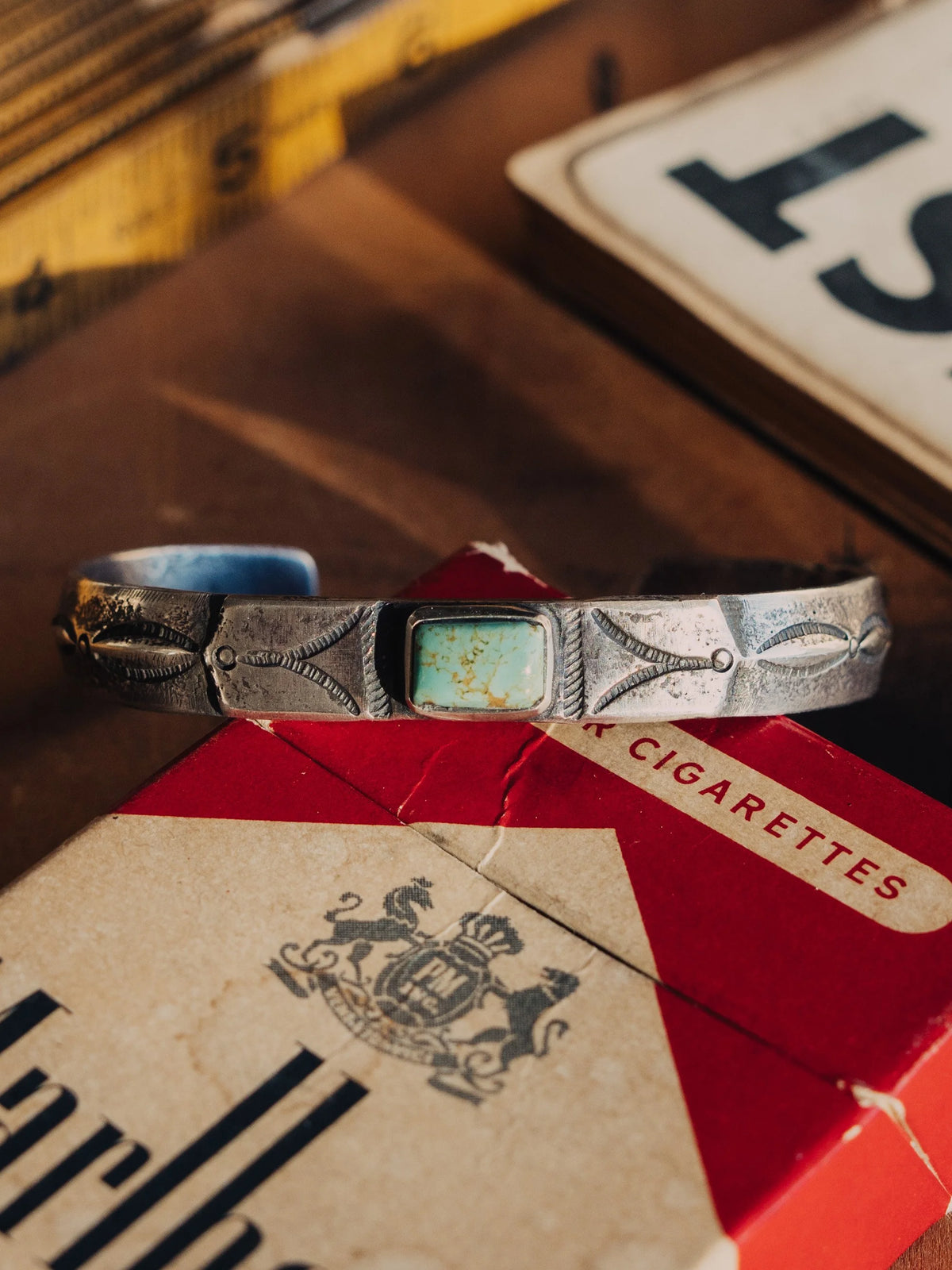 Tufa-cast and hand-stamped in coin silver, set with Manassa turquoise from the dormant King mine
