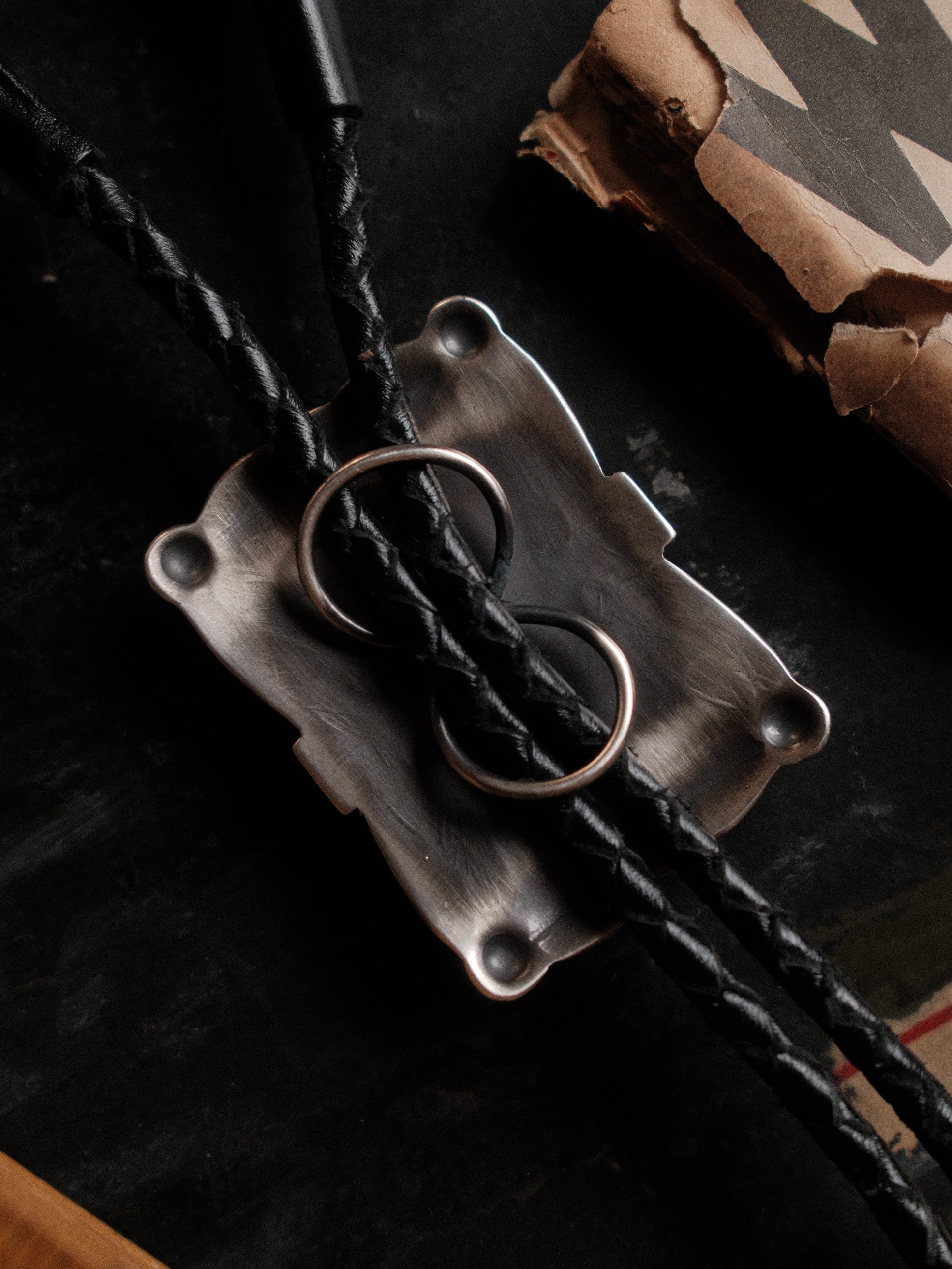 Nevada Royston turquoise on a hand-stamped sterling slide with braided leather cord — view 4