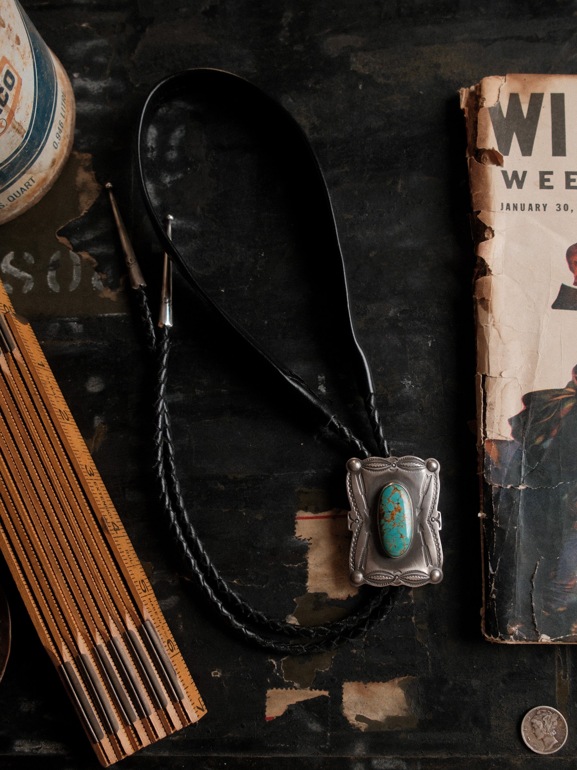 Nevada Royston turquoise on a hand-stamped sterling slide with braided leather cord — view 6