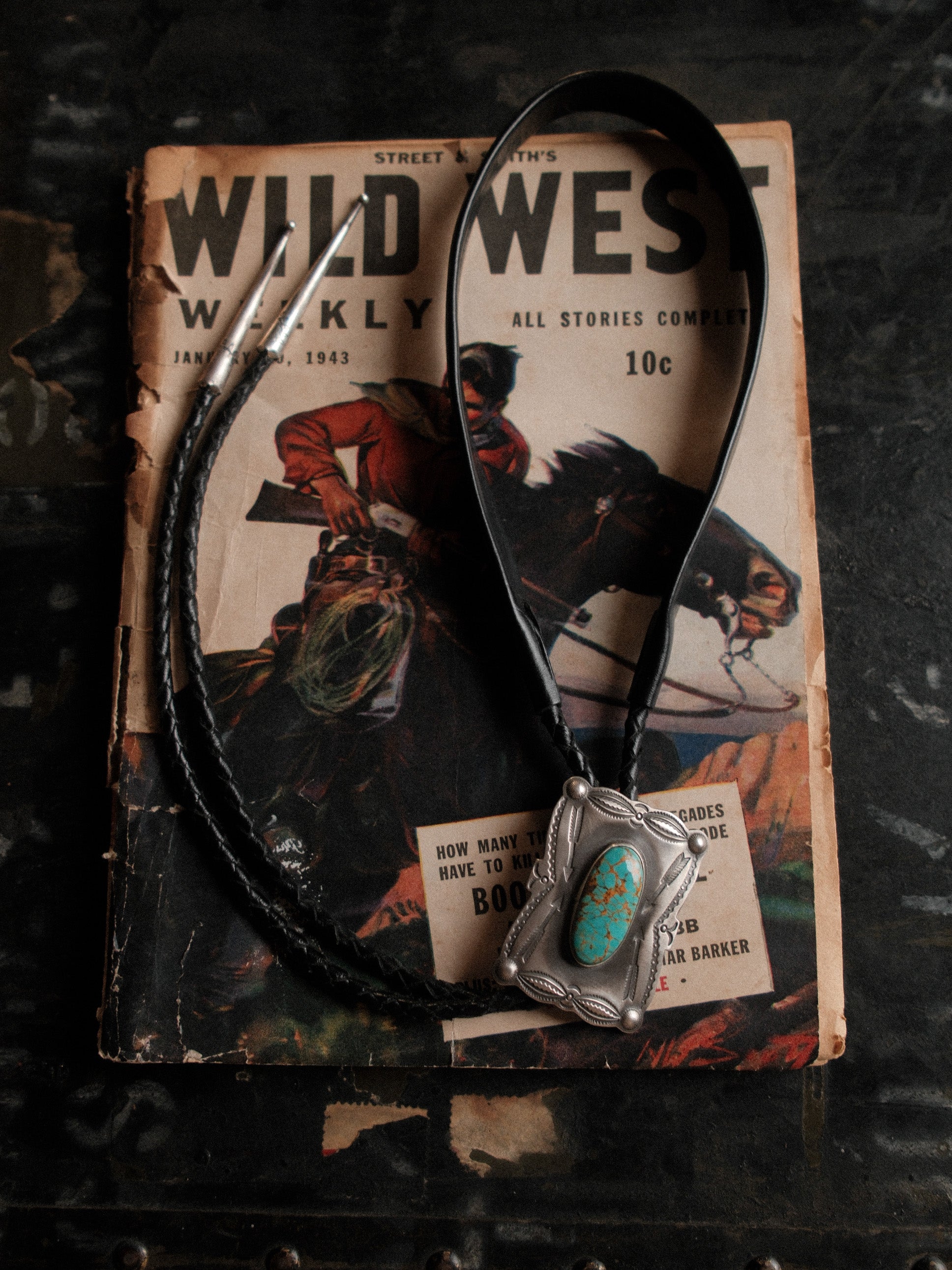 Nevada Royston turquoise on a hand-stamped sterling slide with braided leather cord — view 2