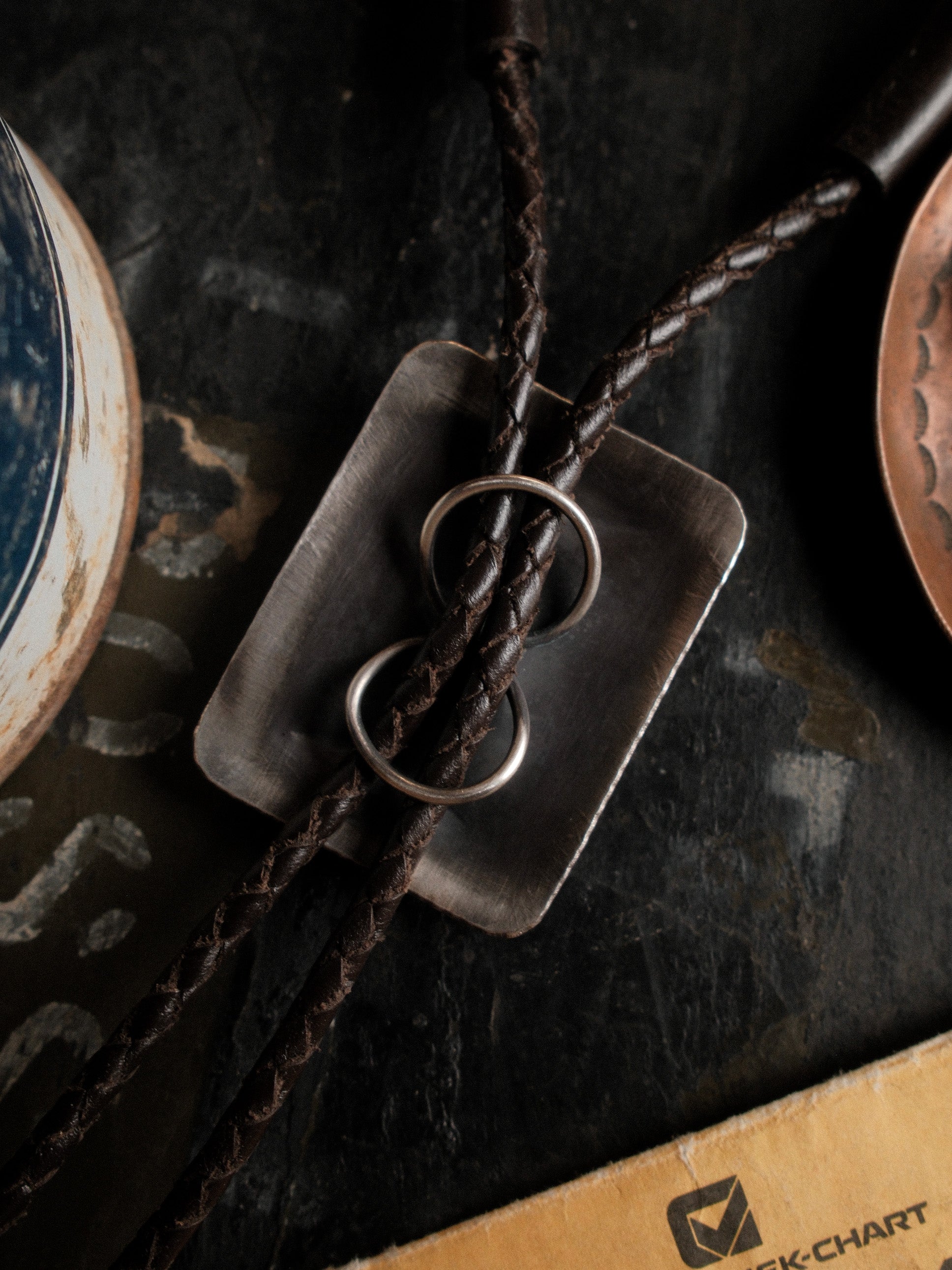 Hand-stamped sterling bolo set with Nevada Royston turquoise on braided leather — view 3
