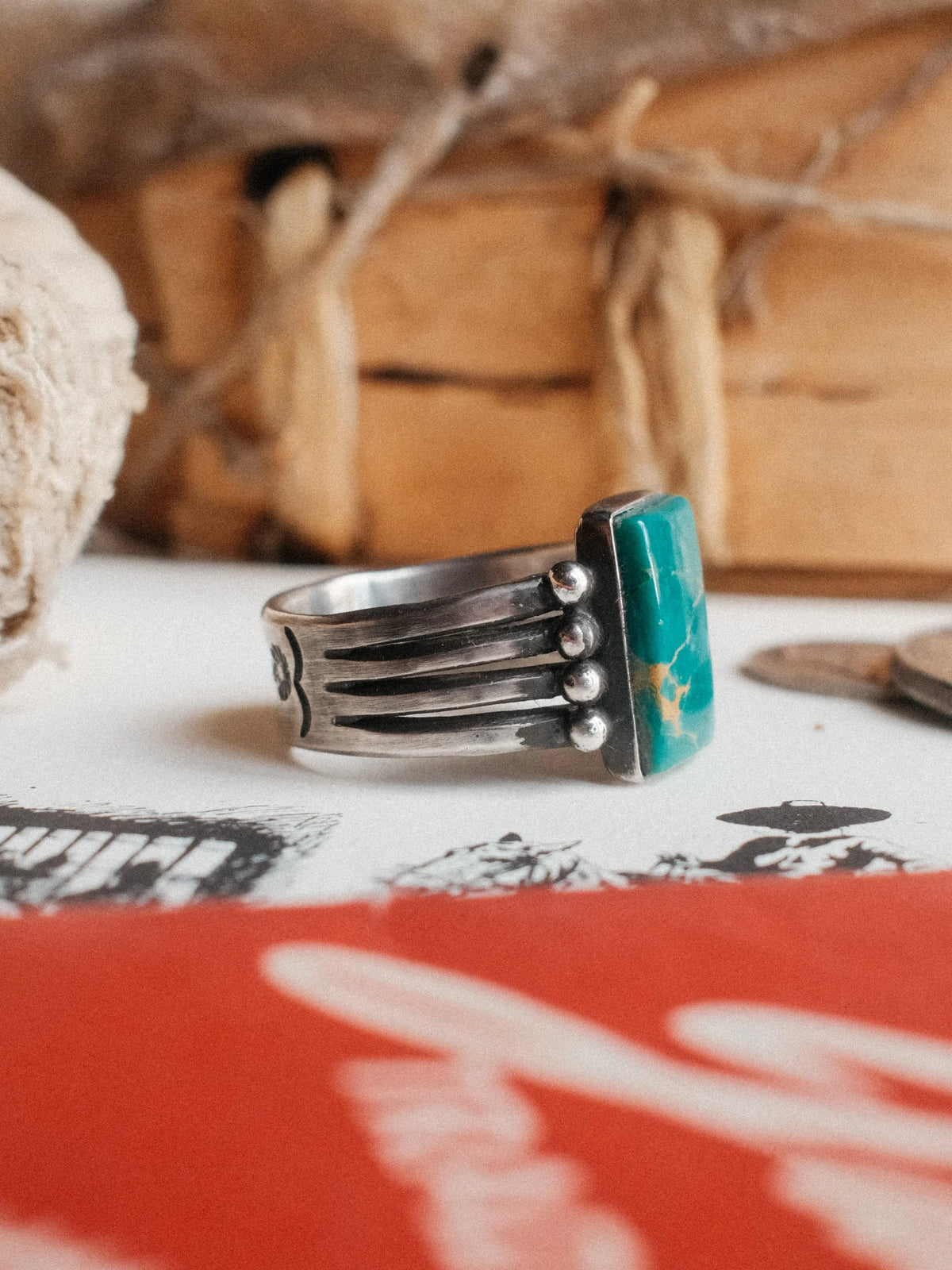 A four-prong split shank dressed in sterling beadwork and set with Royston turquoise from Nevada, hand-stamped throughout — view 2