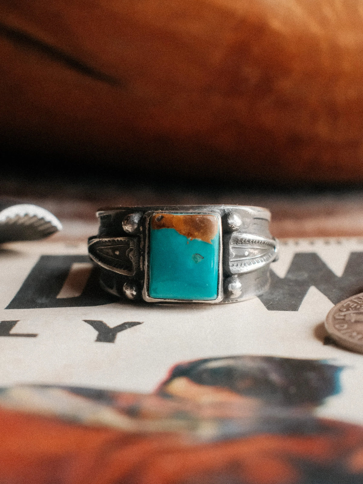 Royston turquoise on a sturdy stamped shank with sterling bead details, hand-stamped throughout