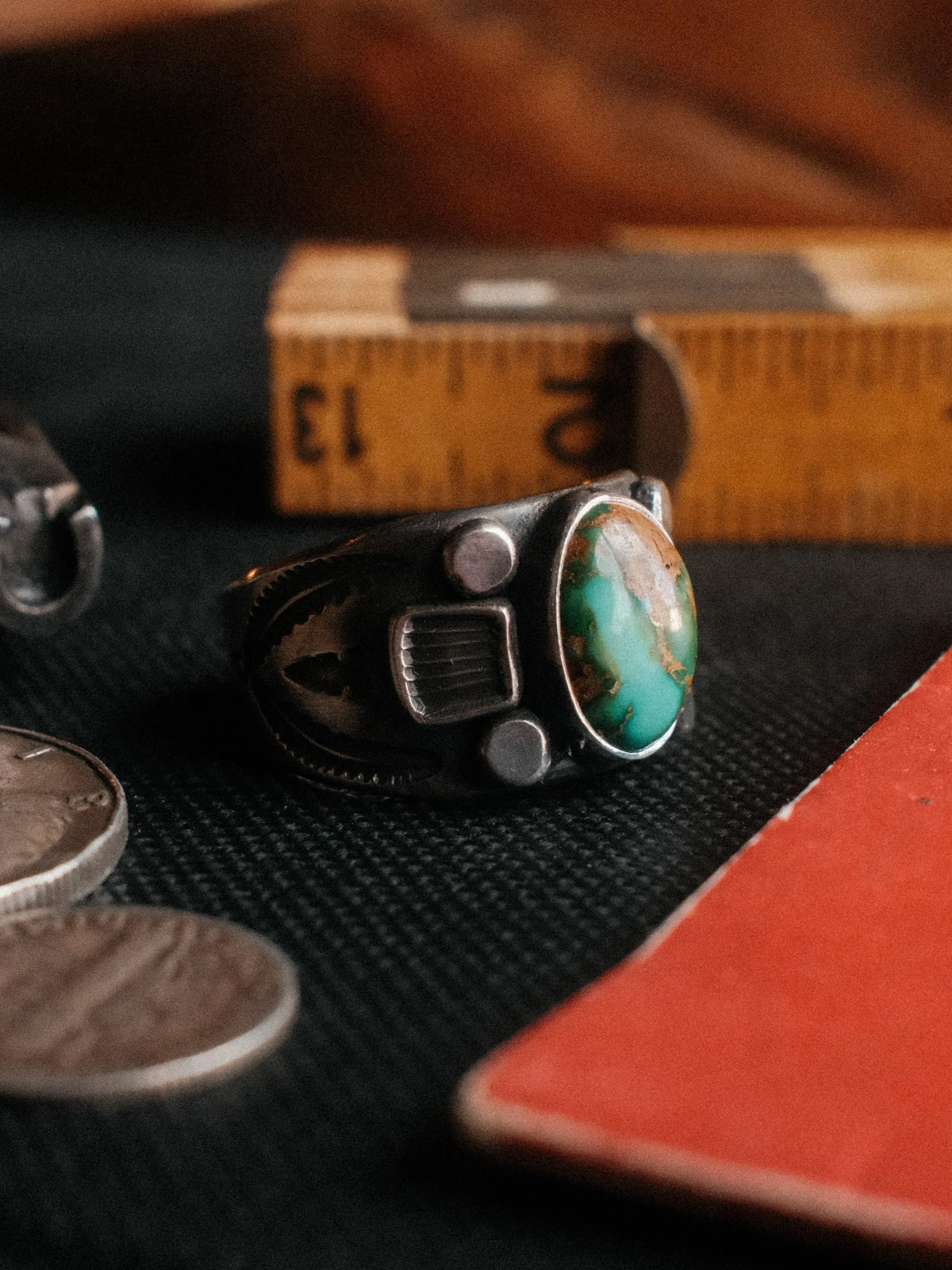 A sturdy Bandolero shank dressed in sterling stampwork and beadwork, set with Royston turquoise from Nevada — view 2
