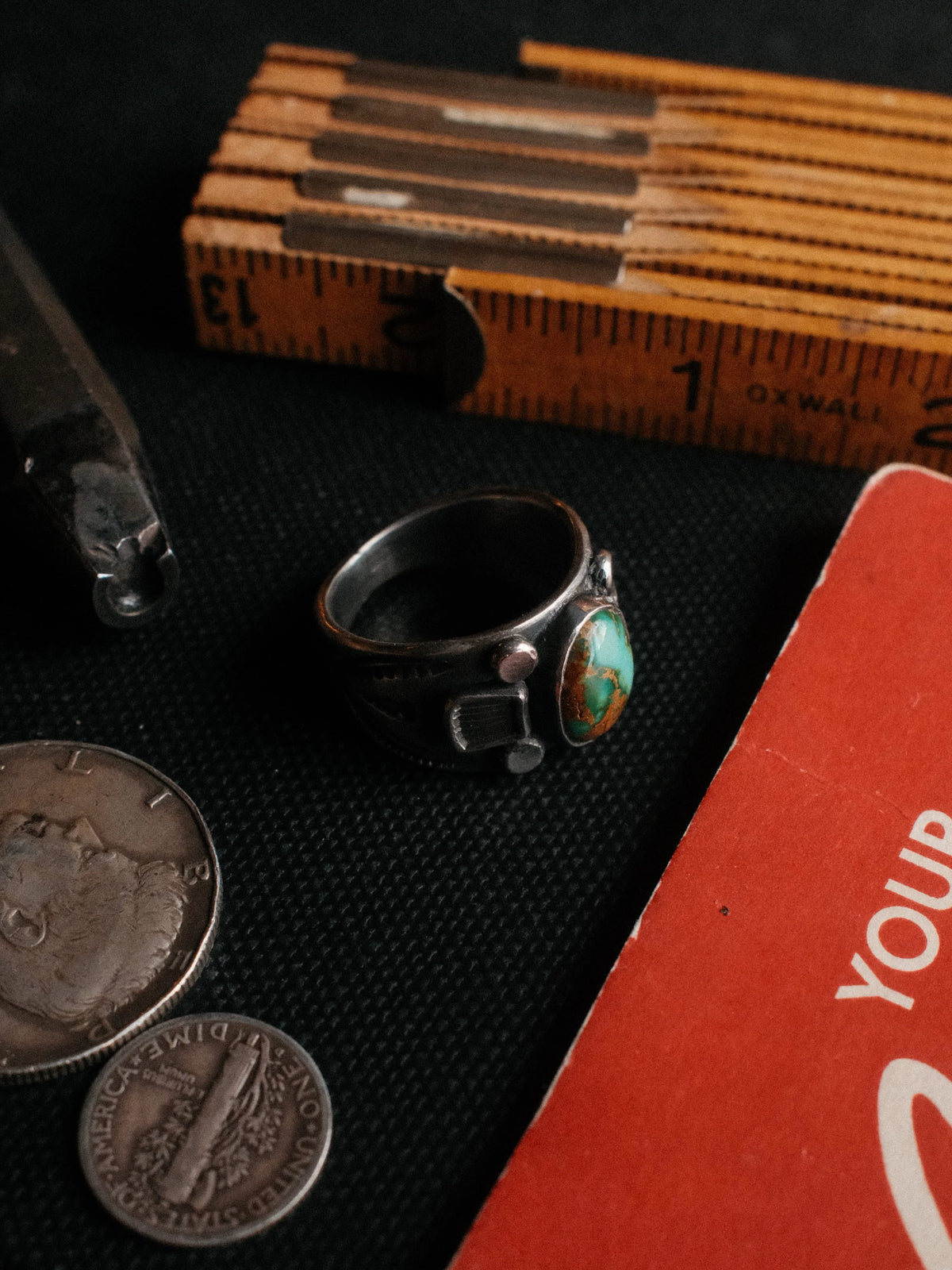 A sturdy Bandolero shank dressed in sterling stampwork and beadwork, set with Royston turquoise from Nevada — view 4