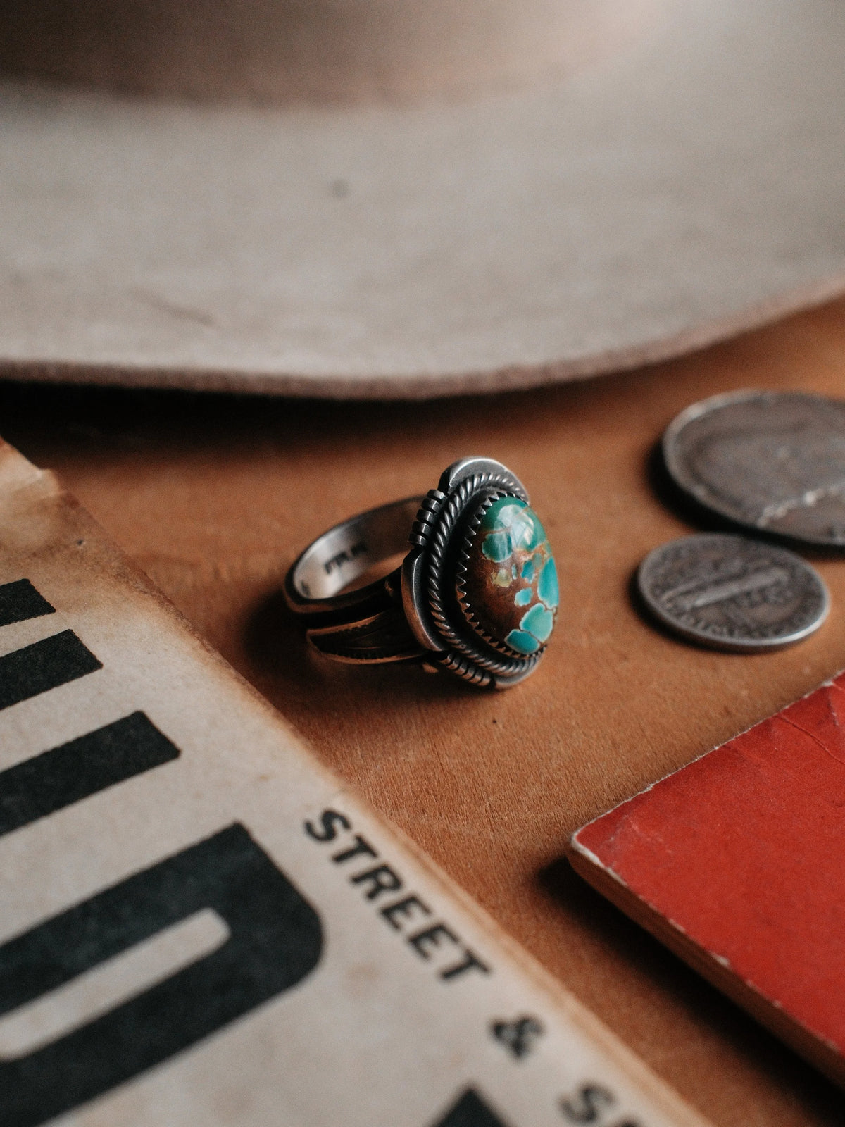 Set with Sierra Nevada turquoise inside a hand-cut border and twist wire, hand-stamped throughout — view 4