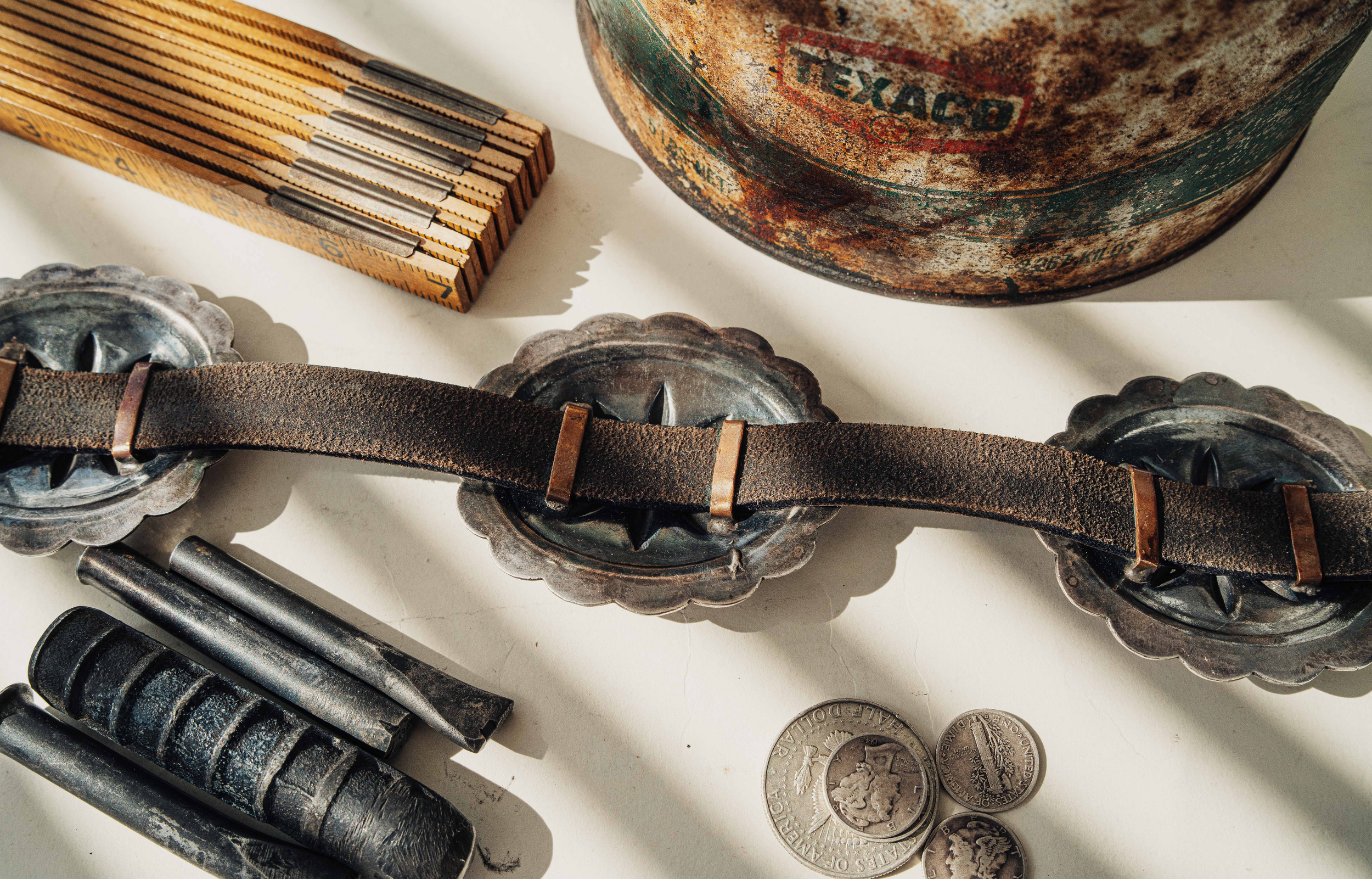 A vintage handmade concho belt — eight sterling silver conchos on black leather with a natural patina earned over decades — view 3