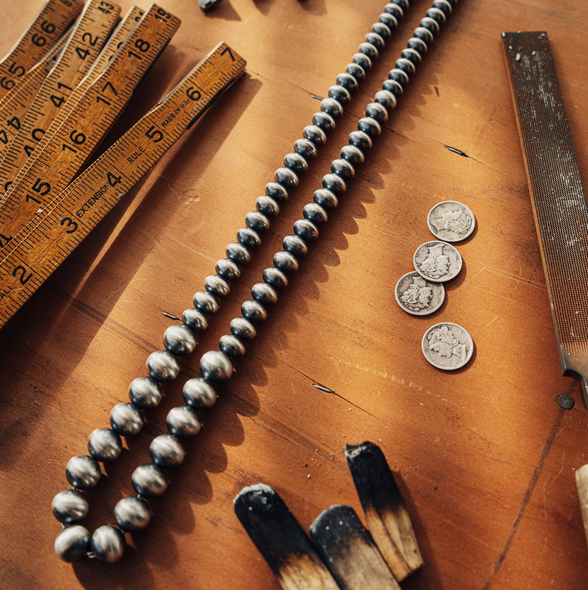 Genuine handmade Navajo Pearls — graduated sterling silver beads on a 24" strand with hook-and-eye clasp — view 2