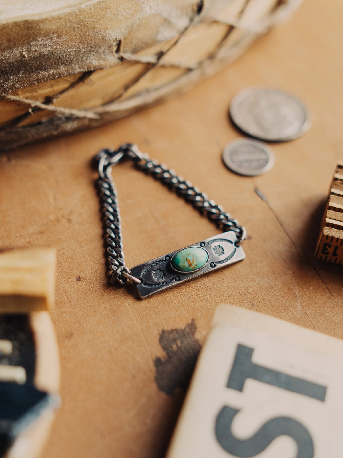 Manassa turquoise on a hand-stamped ID plate and sterling chain, finished with an aged patina and sister-hook clasp — view 2