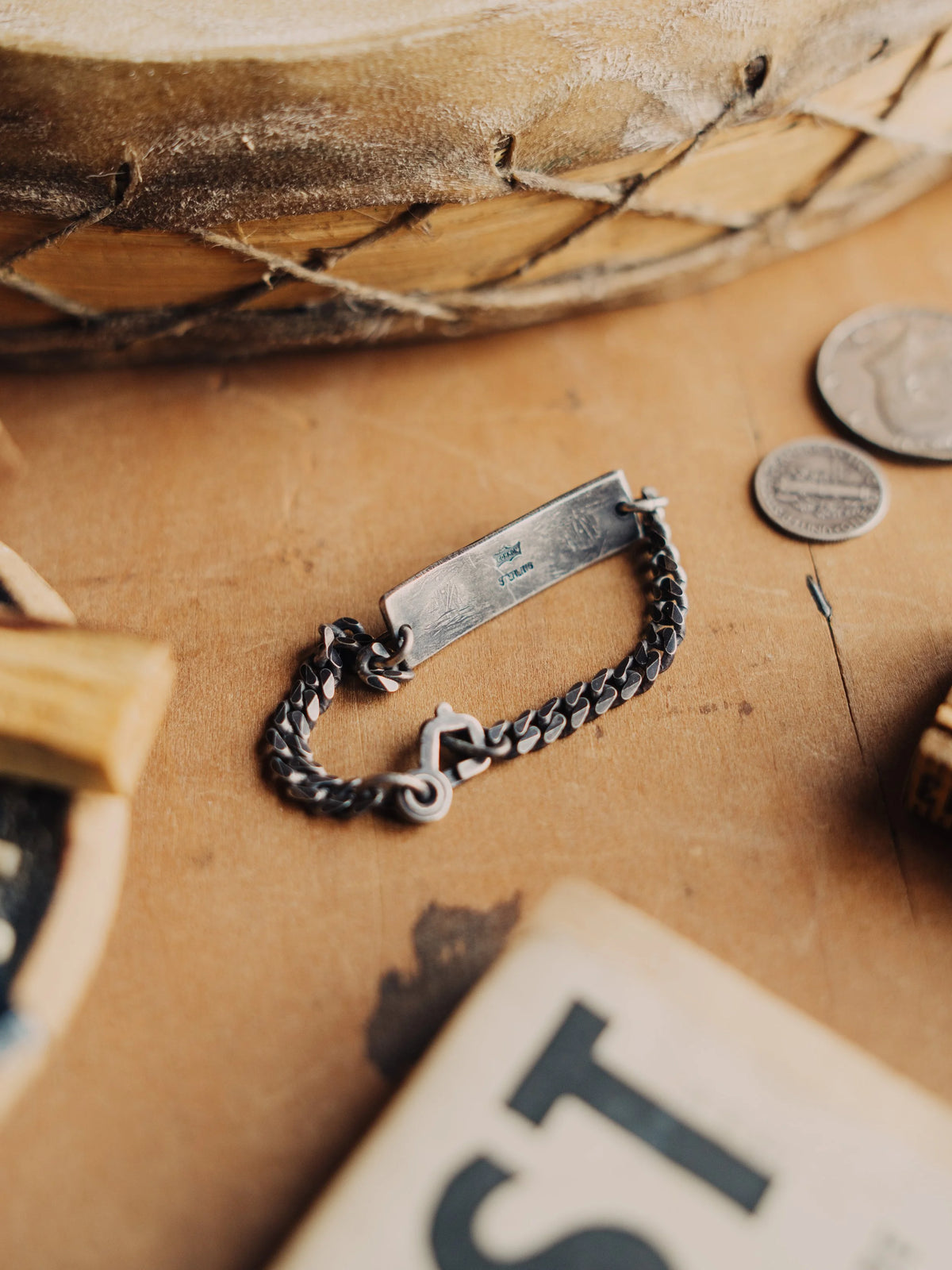 Manassa turquoise on a hand-stamped ID plate and sterling chain, finished with an aged patina and sister-hook clasp — view 3
