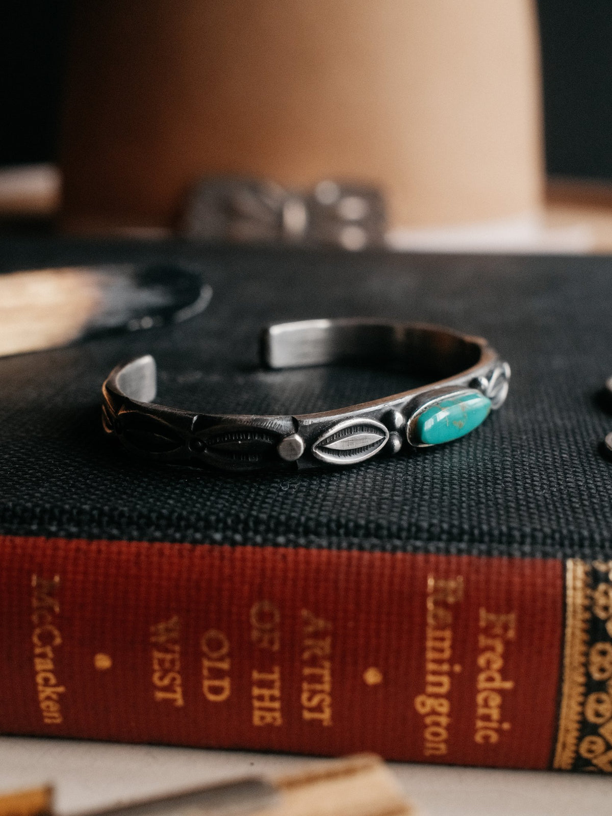 A coin-silver ingot cuff, tufa-cast and intricately hand-stamped, centered on Royston turquoise from Nevada — view 2