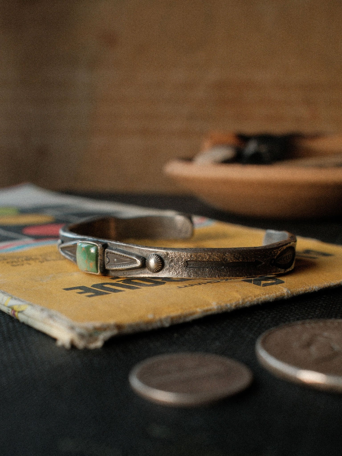 A heavier tufa-cast ingot cuff in sterling, hand-stamped and set with Royston turquoise from Nevada — view 2