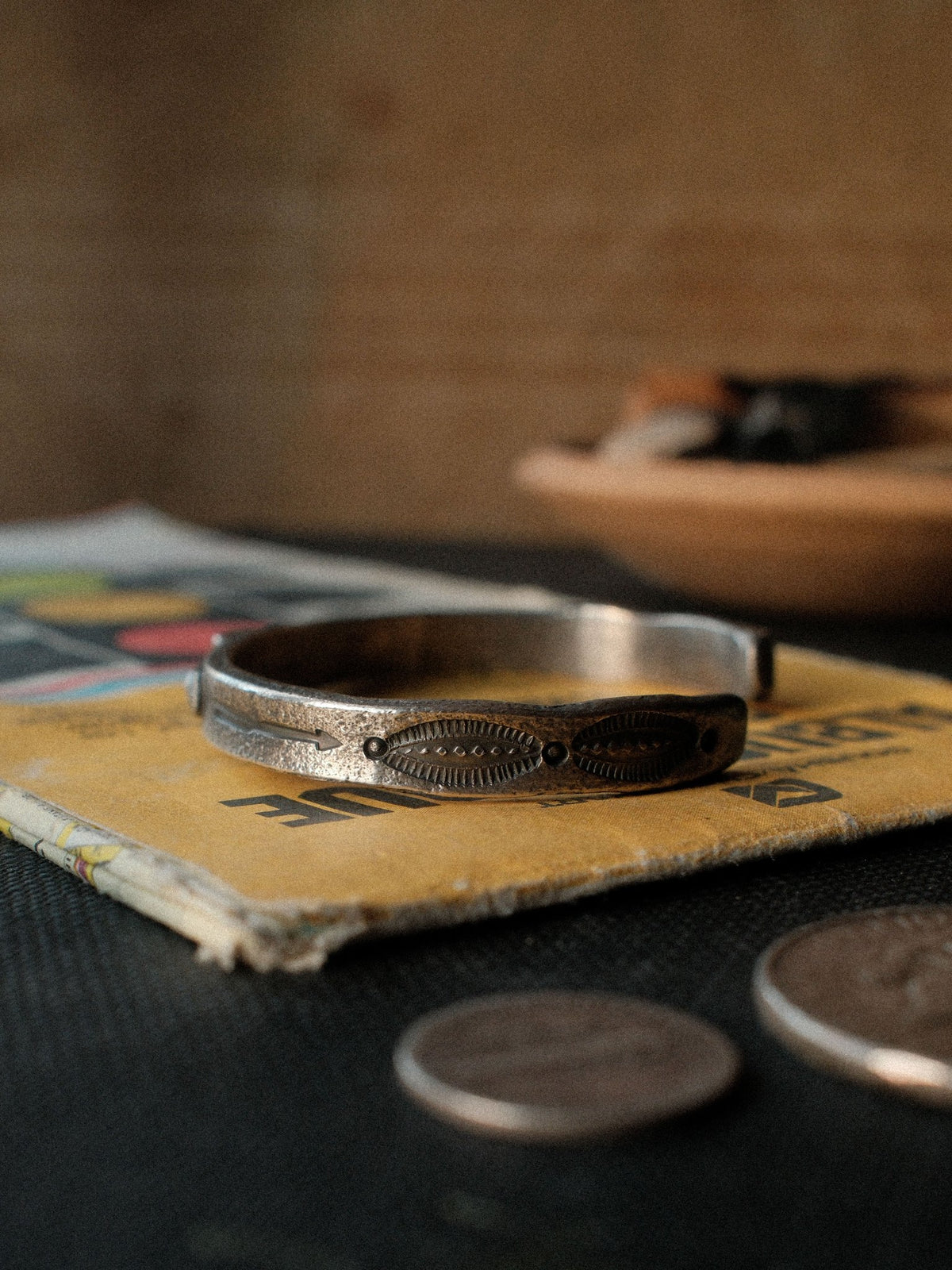 A heavier tufa-cast ingot cuff in sterling, hand-stamped and set with Royston turquoise from Nevada — view 3