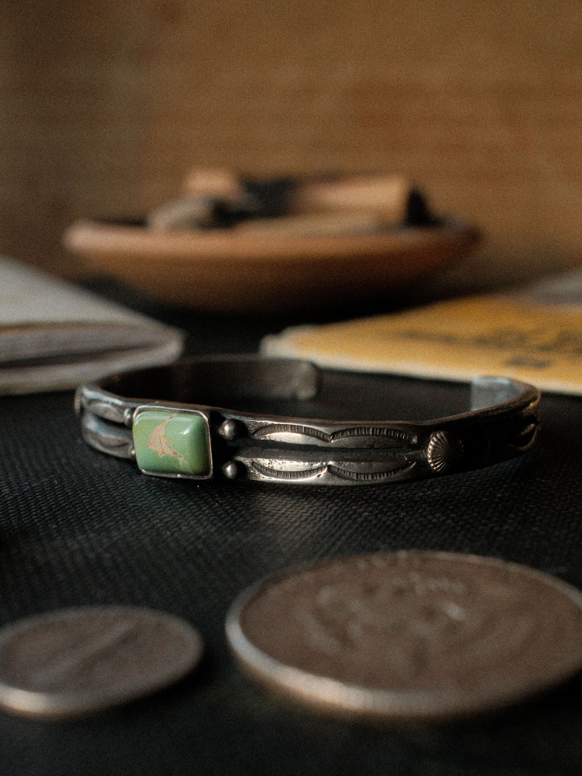 A tufa-cast split cuff hand-stamped with Chad's own steel and set with Royston turquoise — view 2