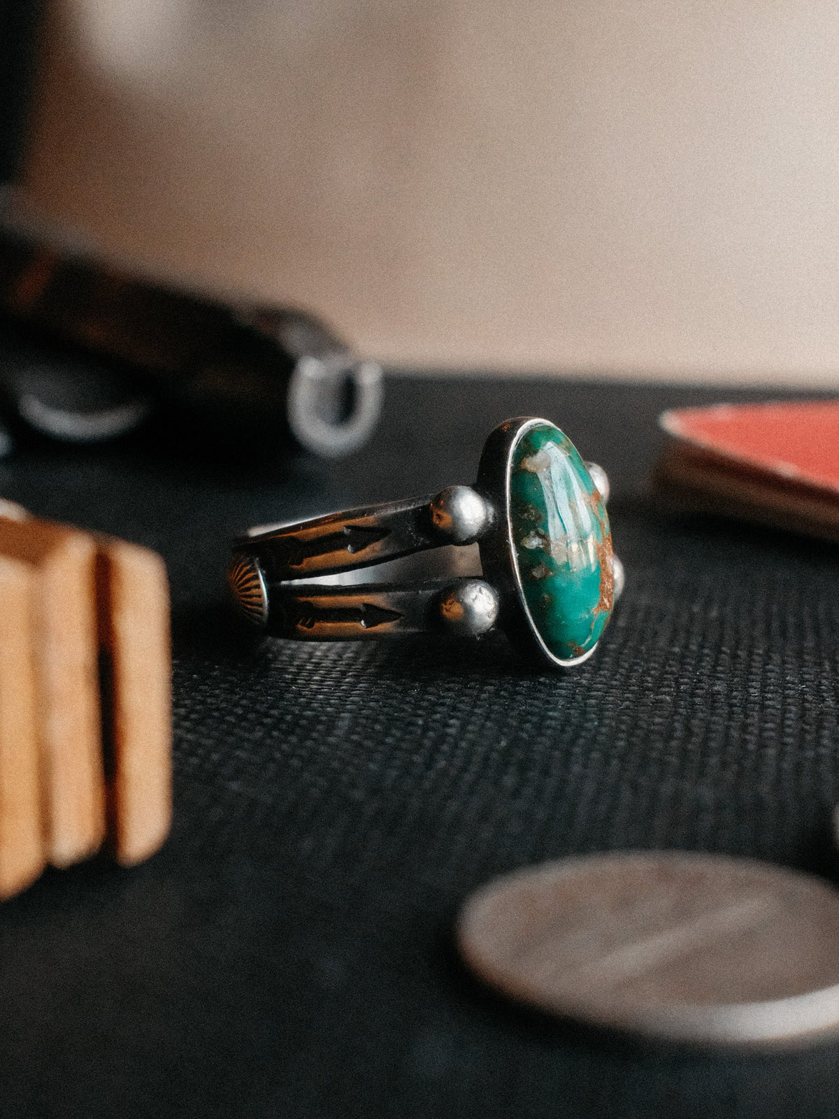 A two-prong split shank dressed in sterling conchos and beadwork, hand-stamped and set with Royston turquoise from Nevada — view 2
