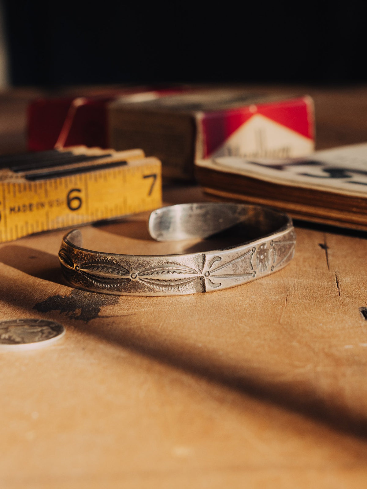 Poured from a tufa-cast ingot and hand-stamped with a thunderbird across the face, worked in coin silver — view 2
